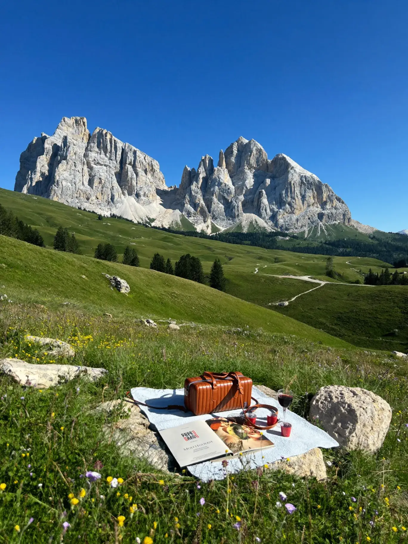 A group walking together in the hills of Northern Italy