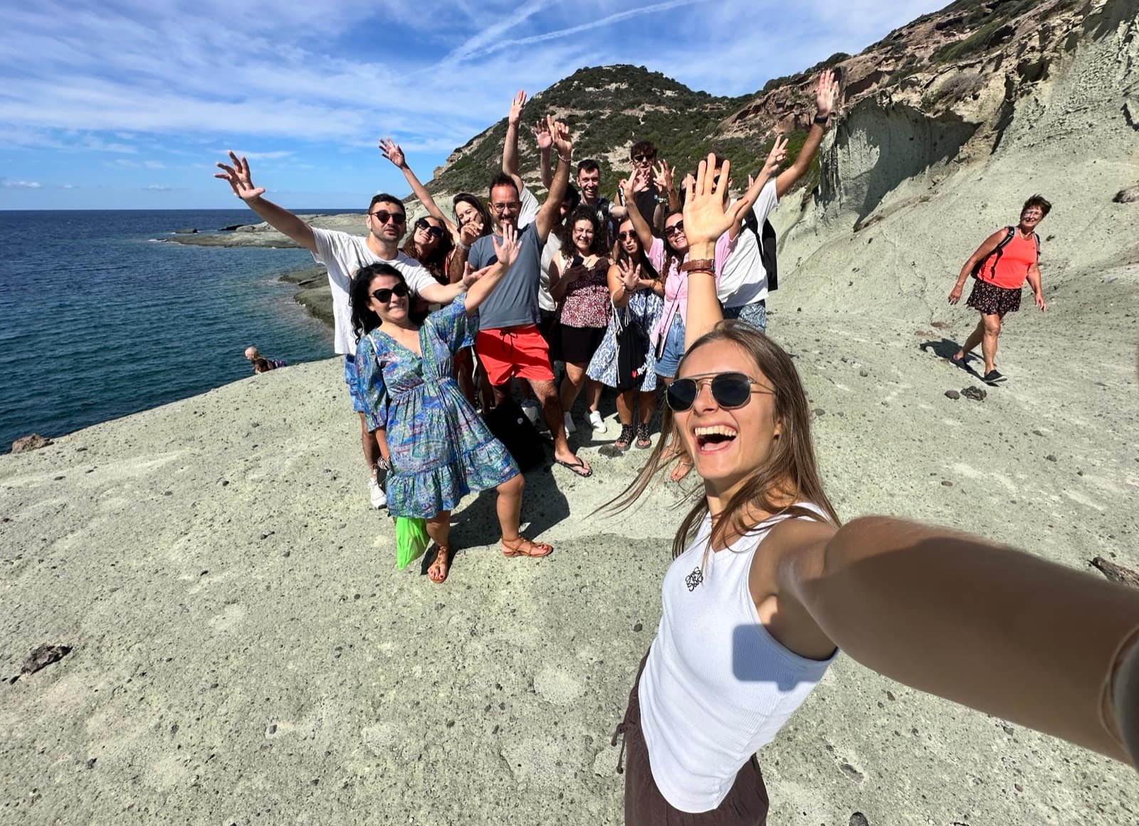 A group together on the coast