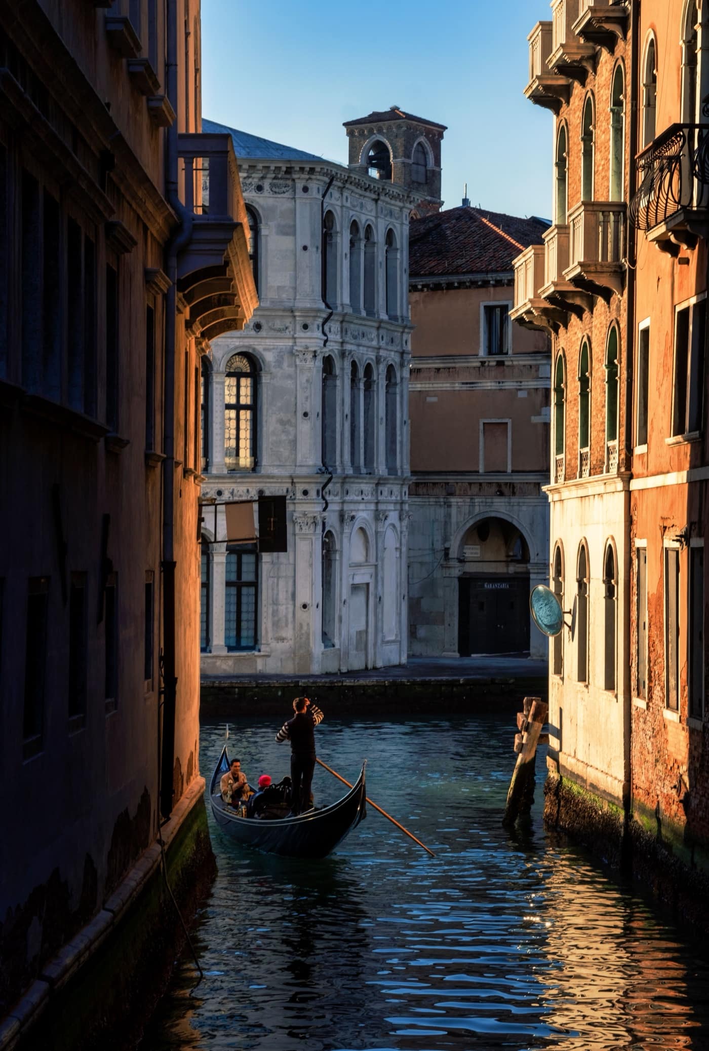 A gondola on a quiet canal in Venice